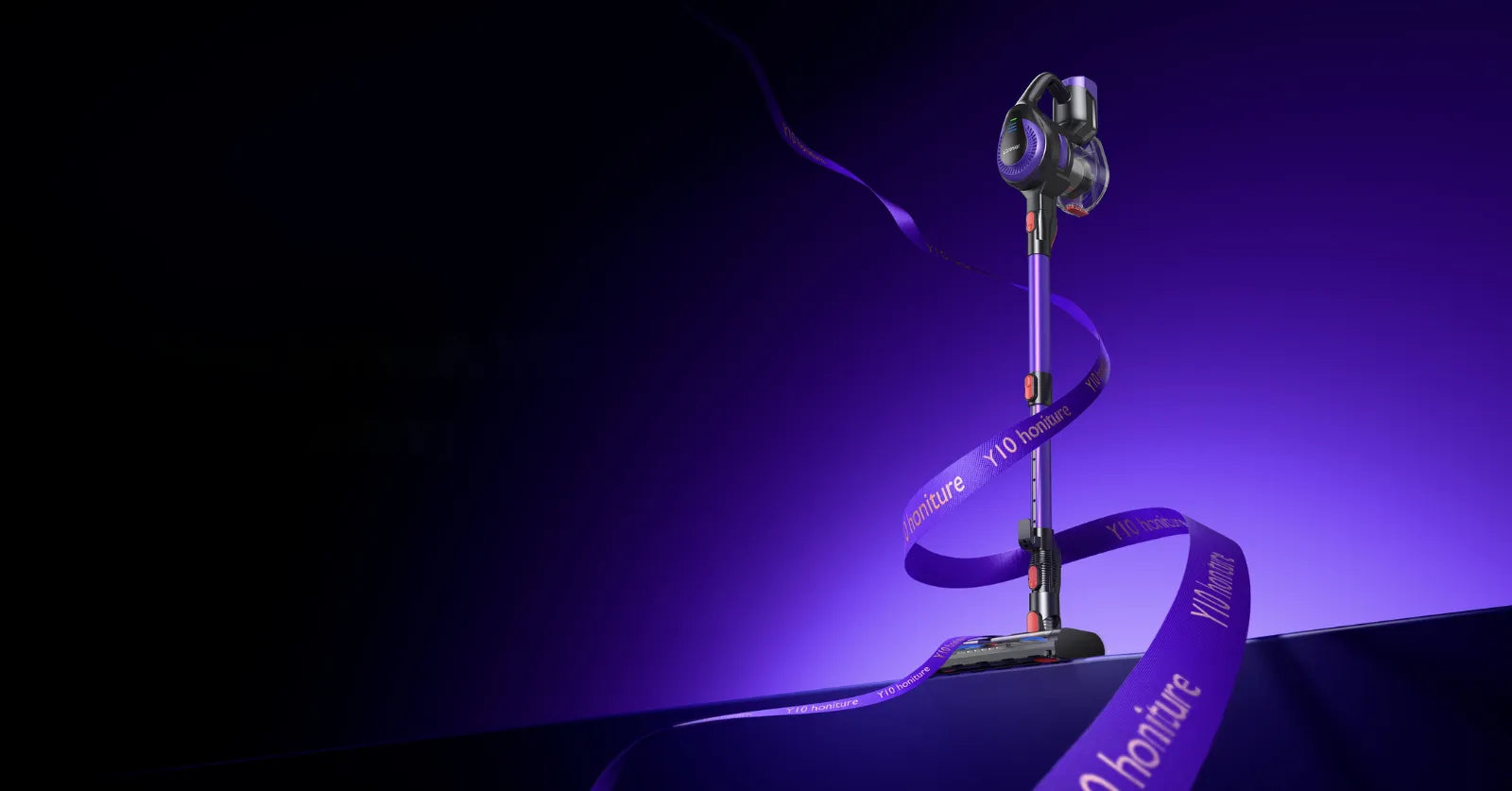 Escoba eléctrica inalámbrica Honiture Y10 en color violeta con rodillo antienredos para una limpieza sin enredos de pelo