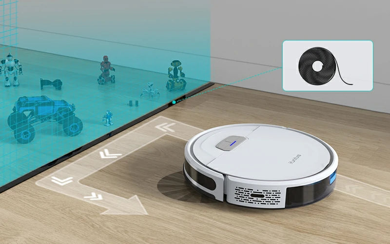 Robot aspirador Honiture G20 respetando un área delimitada por banda magnética alrededor de juguetes infantiles esparcidos.